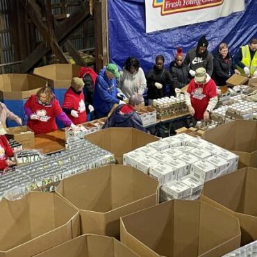 Volunteers pack 8,000 Easter food boxes