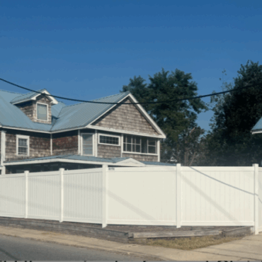 Local business installs new fence for safe sober living home