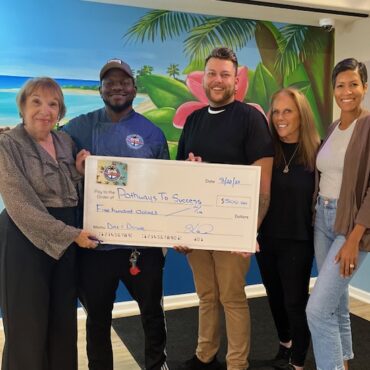 Pathways to Success accepts dining fundraiser proceeds